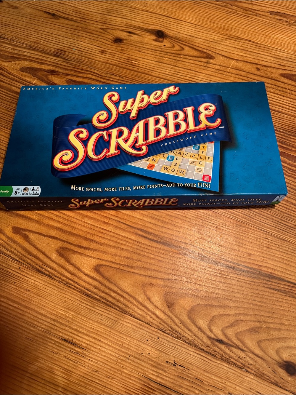 Super Scrabble Game with more tiles and larger board with more spaces